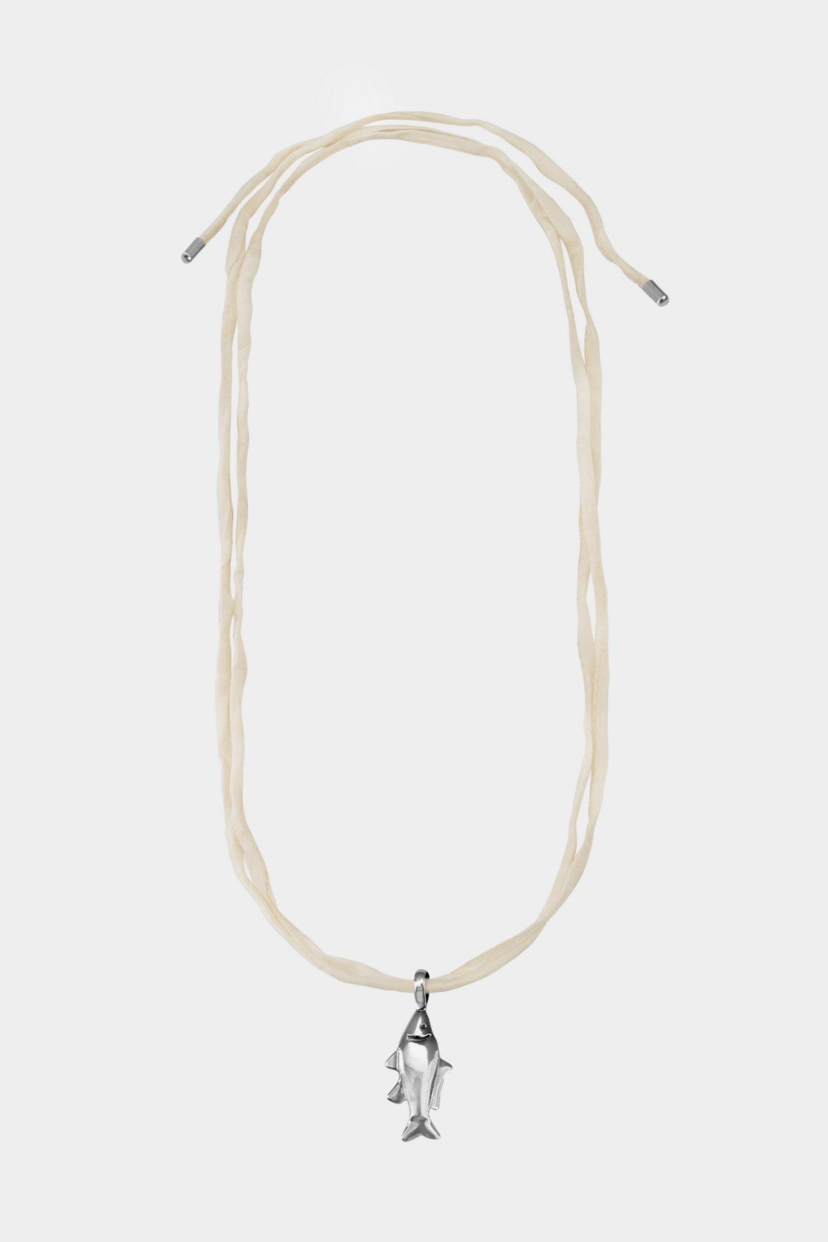 Lucky Fish on Raw Silk: Cream / Sterling Silver