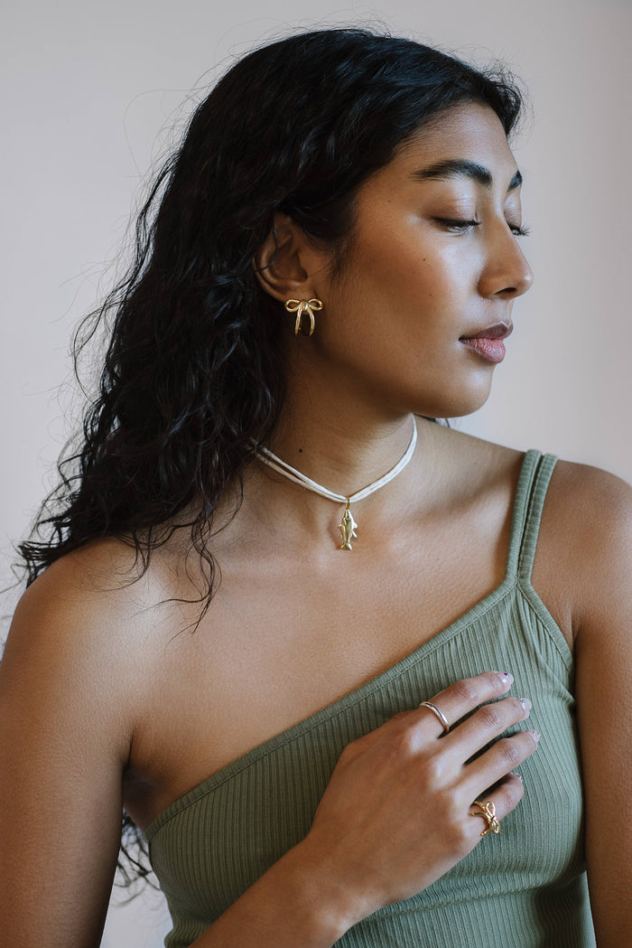 Lucky Fish on Raw Silk: Cream / Sterling Silver